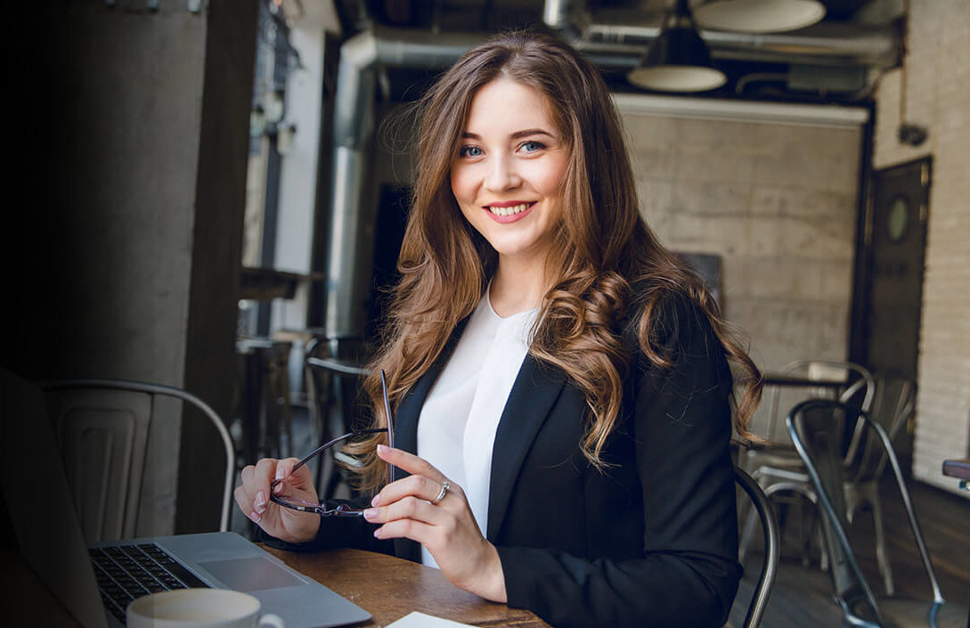 Healthcare communications professional at her desk