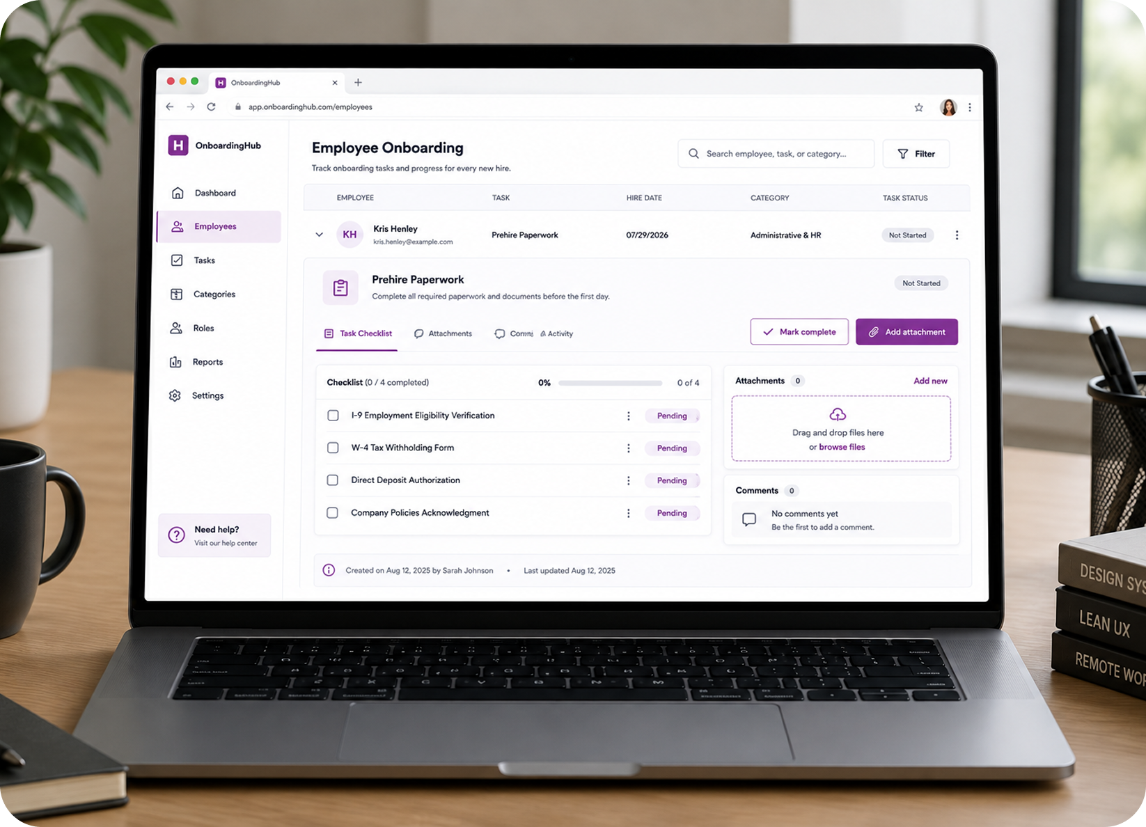 Employee onboarding dashboard on a laptop showing checklist and task status